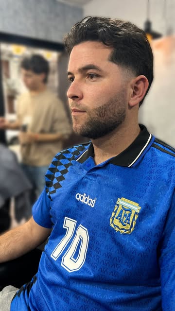 Cliente con fade prolijo en Barbería Simois
